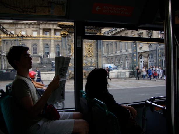 Paris bus ride with paper nan turpin photograph